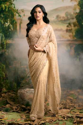 Samyukta Singhania_Beige Net Sweetheart Neck Beaded Saree And Blouse Set _at_Aza_Fashions