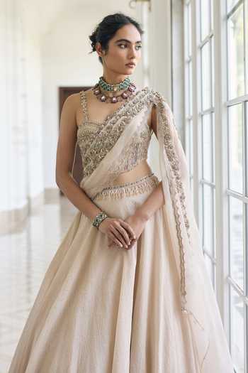 Awigna_Ivory Satin, Modal Sweetheart Neck Zinnia Blouse And Skirt Set _Online_at_Aza_Fashions