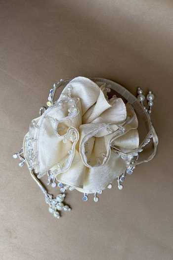 Plode_Ivory Beads, Pearls, Tassels Anaar Embroidered Potli Bag _at_Aza_Fashions