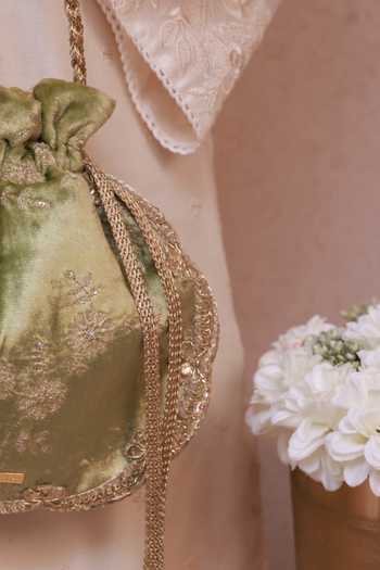 Buy Amyra Green Embroidery, Beads, Pearls, Zari, Tassels Suki Velvet Scallop Potli Online at Aza Fashions Buy_Amyra_Green Embroidery, Beads, Pearls, Zari, Tassels Suki Velvet Scallop Potli _Online_at_Aza_Fashions