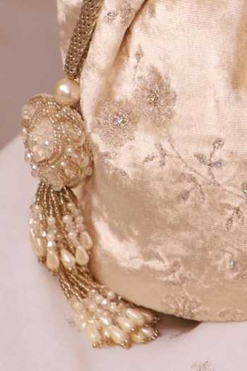 Amyra_Off White Sequins, Beads, Pearls, Tassels Suki Velvet Embroidered Potli _Online_at_Aza_Fashions