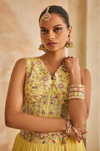 Buy Anu Pellakuru Yellow Silk, Chiffon Beads V-neck Kanak Embroidered Corset And Layered Lehenga Set Buy_Anu Pellakuru_Yellow Silk, Chiffon Beads V-neck Kanak Embroidered Corset And Layered Lehenga Set