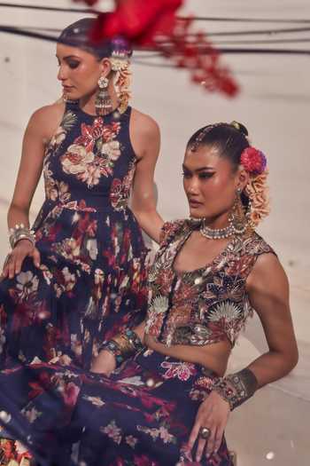 Anu Pellakuru_Navy Chiffon Halter Neck Zeenat Floral Print Frill Tiered Gown _Online_at_Aza_Fashions