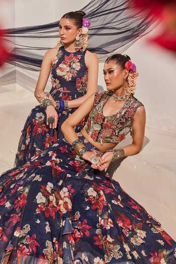 Anu Pellakuru_Navy Chiffon Halter Neck Zeenat Floral Print Frill Tiered Gown _at_Aza_Fashions