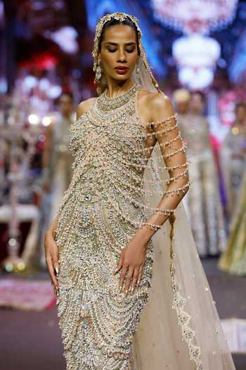 Itrh_Beige Net Stones, Mirrors Halter Neck Sheeshmahal Jadau Gown _Online_at_Aza_Fashions