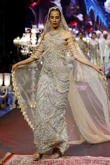 Shop_Itrh_Beige Net Stones, Mirrors Halter Neck Sheeshmahal Jadau Gown _Online_at_Aza_Fashions