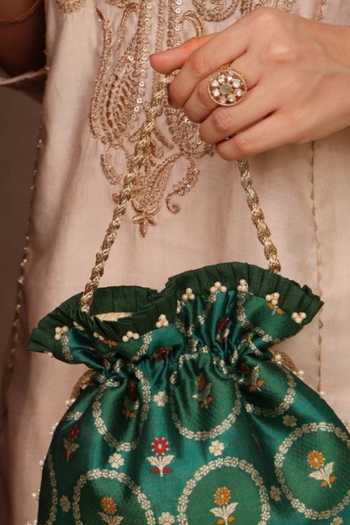 Amyra Green Embroidery, Beads, Pearls, Zari, Tassels Jamal Silk Potli at Aza Fashions Amyra_Green Embroidery, Beads, Pearls, Zari, Tassels Jamal Silk Potli _at_Aza_Fashions