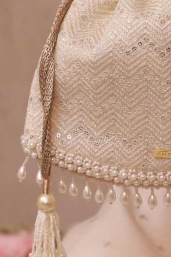 Amyra_Off White Embroidery, Pearls, Tassels, Metallic Thread Mayuri Potli _Online_at_Aza_Fashions