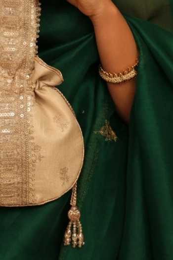 Amyra Beige Embroidery, Sequins, Beads, Zari, Tassels, Metallic Thread Arohi Potli Online at Aza Fashions Amyra_Beige Embroidery, Sequins, Beads, Zari, Tassels, Metallic Thread Arohi Potli _Online_at_Aza_Fashions