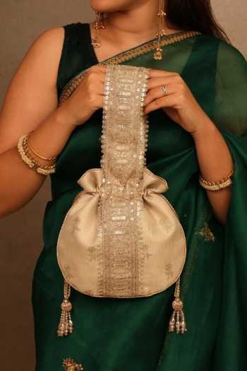 Buy Amyra Beige Embroidery, Sequins, Beads, Zari, Tassels, Metallic Thread Arohi Potli Buy_Amyra_Beige Embroidery, Sequins, Beads, Zari, Tassels, Metallic Thread Arohi Potli