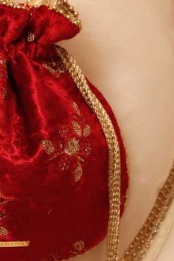 Amyra_Red Embroidery, Beads, Zari, Tassels Ras Velvet Potli _Online_at_Aza_Fashions
