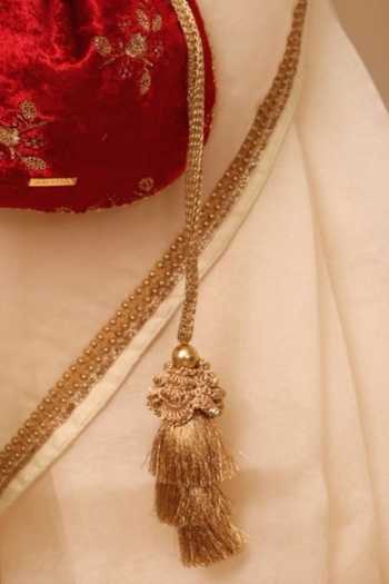 Buy_Amyra_Red Embroidery, Beads, Zari, Tassels Ras Velvet Potli _Online_at_Aza_Fashions