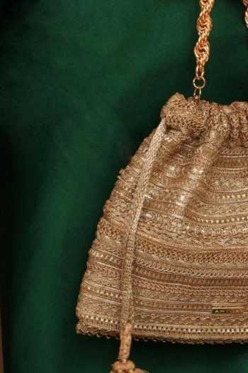 AMYRA Gold Zari, Tassels, Lace Ekaya Textured Pattern Potli at Aza Fashions AMYRA_Gold Zari, Tassels, Lace Ekaya Textured Pattern Potli _at_Aza_Fashions
