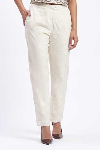 ABRAHAM AND THAKORE_White Chanderi Cut Work Bird Trouser _at_Aza_Fashions