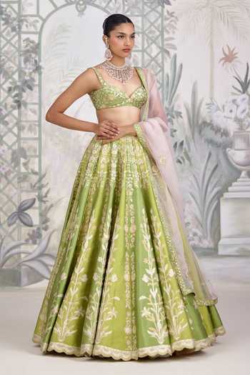 Shyam Narayan Prasad Green Silk Sweetheart Neck Gold Applique Thread Embroidered Raw Lehenga Set at Aza Fashions Shyam Narayan Prasad_Green Silk Sweetheart Neck Gold Applique Thread Embroidered Raw Lehenga Set _at_Aza_Fashions