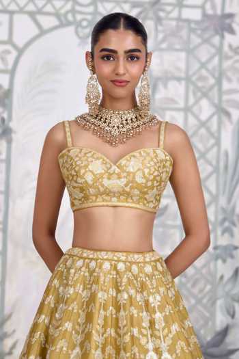Shyam Narayan Prasad Yellow Silk Sweetheart Neck Floral Gold Applique Raw Lehenga Set Online at Aza Fashions Shyam Narayan Prasad_Yellow Silk Sweetheart Neck Floral Gold Applique Raw Lehenga Set _Online_at_Aza_Fashions