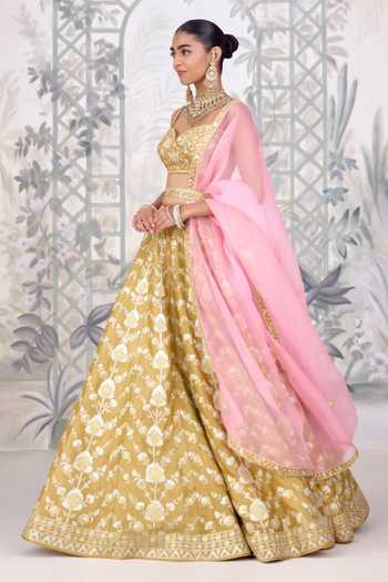 Buy Shyam Narayan Prasad Yellow Silk Sweetheart Neck Floral Gold Applique Raw Lehenga Set Online at Aza Fashions Buy_Shyam Narayan Prasad_Yellow Silk Sweetheart Neck Floral Gold Applique Raw Lehenga Set _Online_at_Aza_Fashions