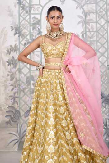 Buy Shyam Narayan Prasad Yellow Silk Sweetheart Neck Floral Gold Applique Raw Lehenga Set Buy_Shyam Narayan Prasad_Yellow Silk Sweetheart Neck Floral Gold Applique Raw Lehenga Set