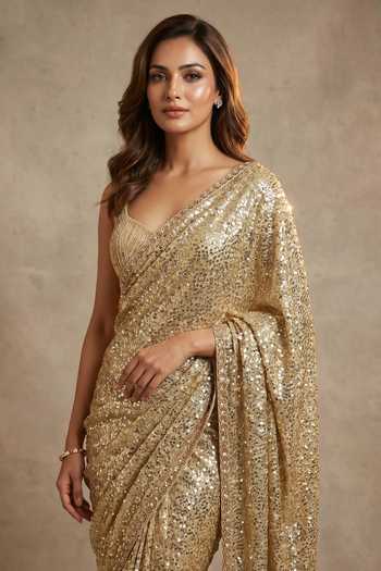 Two Sisters By Gyans_Gold Georgette V-neck Embellished Saree With Unstitched Blouse Piece _Online_at_Aza_Fashions