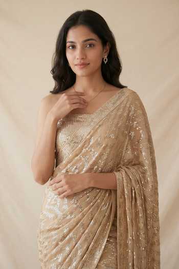 Two Sisters By Gyans_Gold Georgette Bandeau Neck Sequin Embellished Saree And Unstitched Blouse Set _Online_at_Aza_Fashions