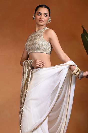 Shop Rishi and Vibhuti Ivory Chiffon High Neck Noor Saree With Sleeveless Embroidered Blouse Online at Aza Fashions Shop_Rishi and Vibhuti_Ivory Chiffon High Neck Noor Saree With Sleeveless Embroidered Blouse _Online_at_Aza_Fashions