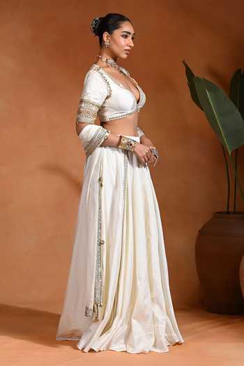 Rishi and Vibhuti Ivory Silk, Organza, Dupion V-neck Star Embroidered Blouse And Lehenga Set Online at Aza Fashions Rishi and Vibhuti_Ivory Silk, Organza, Dupion V-neck Star Embroidered Blouse And Lehenga Set _Online_at_Aza_Fashions
