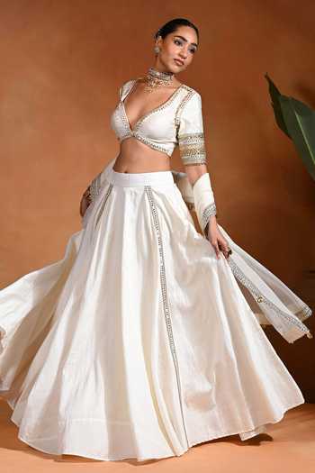 Buy Rishi and Vibhuti Ivory Silk, Organza, Dupion V-neck Star Embroidered Blouse And Lehenga Set Online at Aza Fashions Buy_Rishi and Vibhuti_Ivory Silk, Organza, Dupion V-neck Star Embroidered Blouse And Lehenga Set _Online_at_Aza_Fashions
