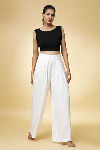 Varsha Wadhwa_White Solid Pleated Palazzo _at_Aza_Fashions