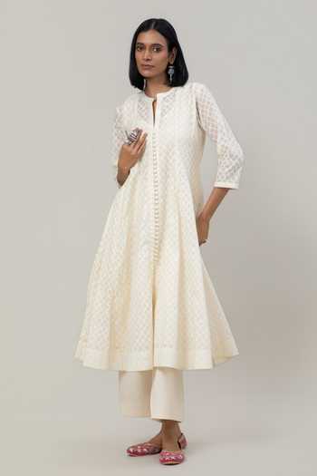 Tuli Ivory Chanderi, Jacquard, Cotton, Organza, Silk Mandarin Nayana Anarkali Set Online at Aza Fashions Tuli_Ivory Chanderi, Jacquard, Cotton, Organza, Silk Mandarin Nayana Anarkali Set _Online_at_Aza_Fashions