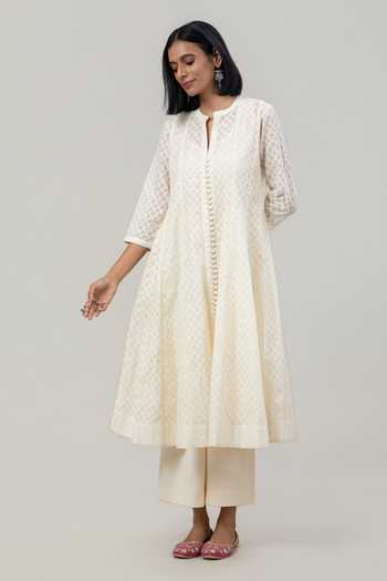 Tuli Ivory Chanderi, Jacquard, Cotton, Organza, Silk Mandarin Nayana Anarkali Set at Aza Fashions Tuli_Ivory Chanderi, Jacquard, Cotton, Organza, Silk Mandarin Nayana Anarkali Set _at_Aza_Fashions