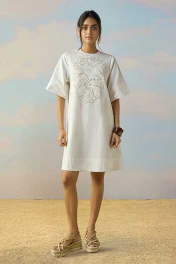 Dash And Dot Ivory Cotton Round Neck Cutwork Embroidered Denim Dress at Aza Fashions Dash And Dot_Ivory Cotton Round Neck Cutwork Embroidered Denim Dress _at_Aza_Fashions