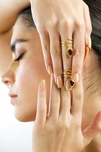 Buy MAALICIOUS JEWELRY Gold Plated Gilded Coil Garnet January Birthstone Ring Online at Aza Fashions Buy_MAALICIOUS JEWELRY_Gold Plated Gilded Coil Garnet January Birthstone Ring _Online_at_Aza_Fashions