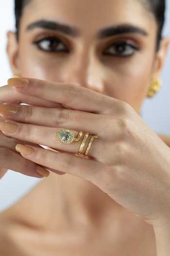 MAALICIOUS JEWELRY Gilded Coil Blue Topaz December Birthstone Ring 