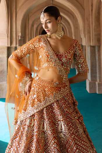 Shop ANGAD SINGH Orange Organza V-neck Tej Embroidered Lehenga Set Online at Aza Fashions Shop_ANGAD SINGH_Orange Organza V-neck Tej Embroidered Lehenga Set _Online_at_Aza_Fashions