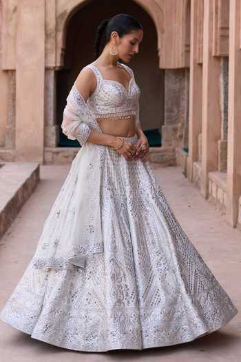 Buy_ANGAD SINGH_Ivory Silk Sweetheart Neck Chaandni Raw Embroidered Lehenga Set _Online_at_Aza_Fashions