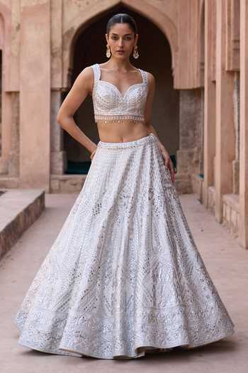 ANGAD SINGH_Ivory Silk Sweetheart Neck Chaandni Raw Embroidered Lehenga Set _at_Aza_Fashions