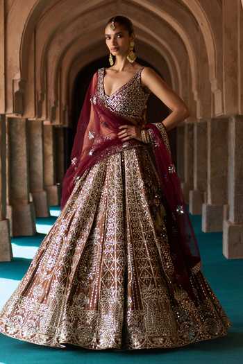 ANGAD SINGH Maroon Silk V-neck Prithvi Embroidered Raw Bridal Lehenga Set at Aza Fashions ANGAD SINGH_Maroon Silk V-neck Prithvi Embroidered Raw Bridal Lehenga Set _at_Aza_Fashions