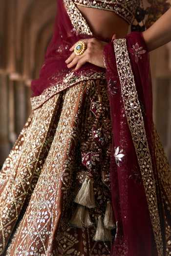 Shop ANGAD SINGH Maroon Silk V-neck Prithvi Embroidered Raw Bridal Lehenga Set Shop_ANGAD SINGH_Maroon Silk V-neck Prithvi Embroidered Raw Bridal Lehenga Set