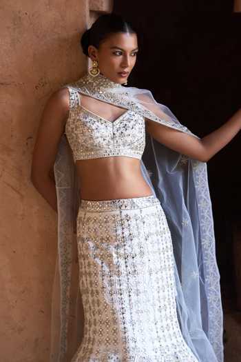 Shop ANGAD SINGH Ivory Silk Sweetheart Neck Nirmal Embroidered Mermaid Lehenga Set Online at Aza Fashions Shop_ANGAD SINGH_Ivory Silk Sweetheart Neck Nirmal Embroidered Mermaid Lehenga Set _Online_at_Aza_Fashions