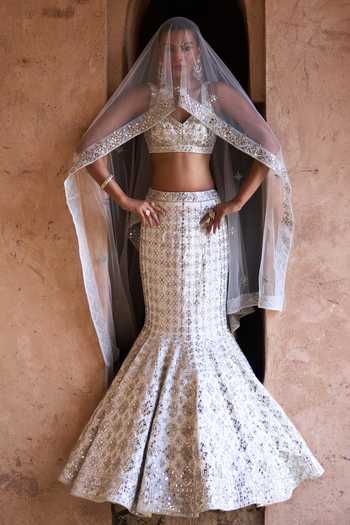 Shop ANGAD SINGH Ivory Silk Sweetheart Neck Nirmal Embroidered Mermaid Lehenga Set Shop_ANGAD SINGH_Ivory Silk Sweetheart Neck Nirmal Embroidered Mermaid Lehenga Set