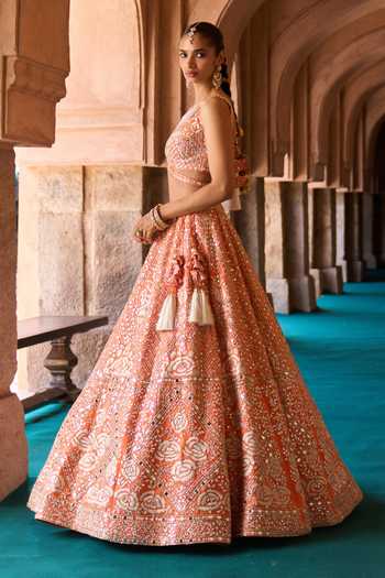 Buy ANGAD SINGH Orange Silk Sweetheart Neck Suraj Mirror Embroidered Raw Lehenga Set Buy_ANGAD SINGH_Orange Silk Sweetheart Neck Suraj Mirror Embroidered Raw Lehenga Set