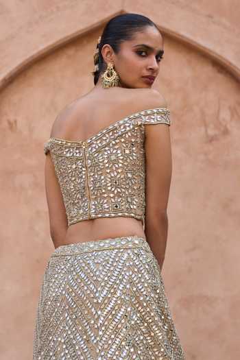 Shop ANGAD SINGH Gold Net Sweetheart Neck Sunehri Embroidered Corset Lehenga Set Online at Aza Fashions Shop_ANGAD SINGH_Gold Net Sweetheart Neck Sunehri Embroidered Corset Lehenga Set _Online_at_Aza_Fashions