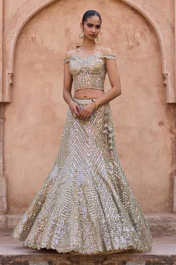 ANGAD SINGH Gold Net Sweetheart Neck Sunehri Embroidered Corset Lehenga Set at Aza Fashions ANGAD SINGH_Gold Net Sweetheart Neck Sunehri Embroidered Corset Lehenga Set _at_Aza_Fashions
