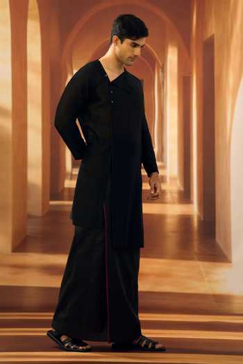 Vivek Karunakaran_Black Silk Up Down Hem Noir Kurta With Veshti _at_Aza_Fashions