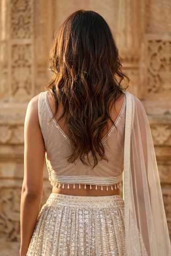 Buy_Basanti Kapde aur Koffee_Ivory Net V-neck Sequins Work Lehenga Set _Online_at_Aza_Fashions