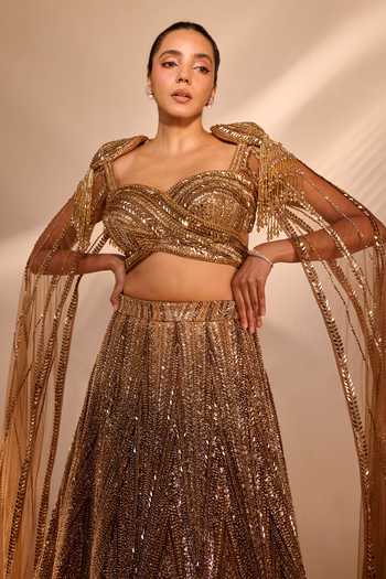 Rachit Khanna Gold Satin, Tulle Sweetheart Neck Sequin Work Blouse And Skirt Set at Aza Fashions Rachit Khanna_Gold Satin, Tulle Sweetheart Neck Sequin Work Blouse And Skirt Set _at_Aza_Fashions