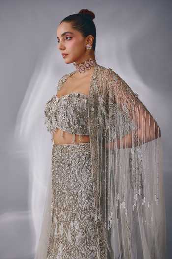Rachit Khanna Silver Satin, Tulle Stones, Tassels Bandeau Cutdana Embellished Lehenga Set at Aza Fashions Rachit Khanna_Silver Satin, Tulle Stones, Tassels Bandeau Cutdana Embellished Lehenga Set _at_Aza_Fashions