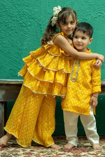 Buy_Rage Attire-Sweta Saria_Yellow Chinon Bandhani Sharara And Tiered Top Set _Online_at_Aza_Fashions