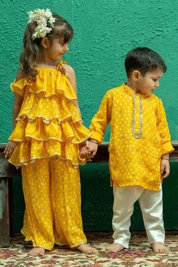 Rage Attire-Sweta Saria_Yellow Chinon Bandhani Sharara And Tiered Top Set _at_Aza_Fashions