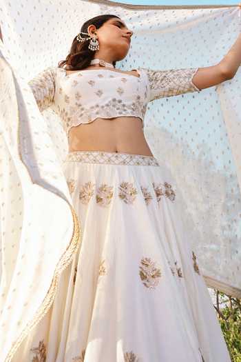 Shop HOUSE OF TA-YA Ivory Silk, Viscose Square Neck Embroidered Lehenga Set Online at Aza Fashions Shop_HOUSE OF TA-YA_Ivory Silk, Viscose Square Neck Embroidered Lehenga Set _Online_at_Aza_Fashions